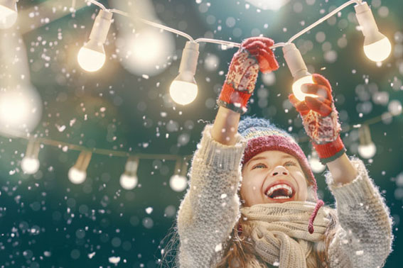 outdoor string lights hanging on a line in backyard