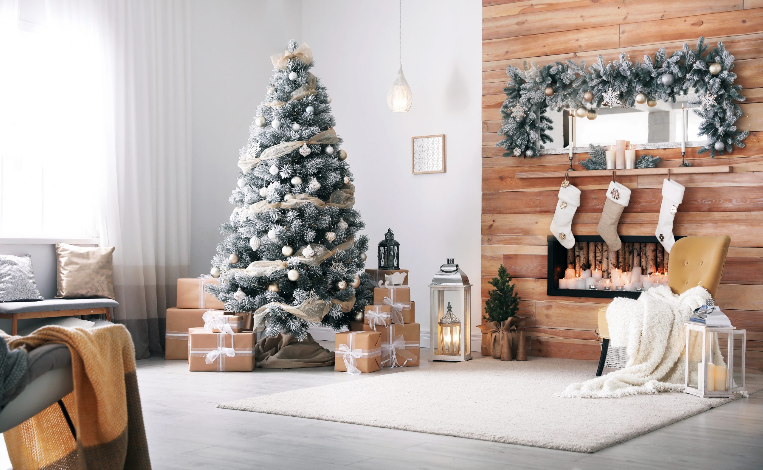 Festive interior with decorated Christmas tree and fireplace