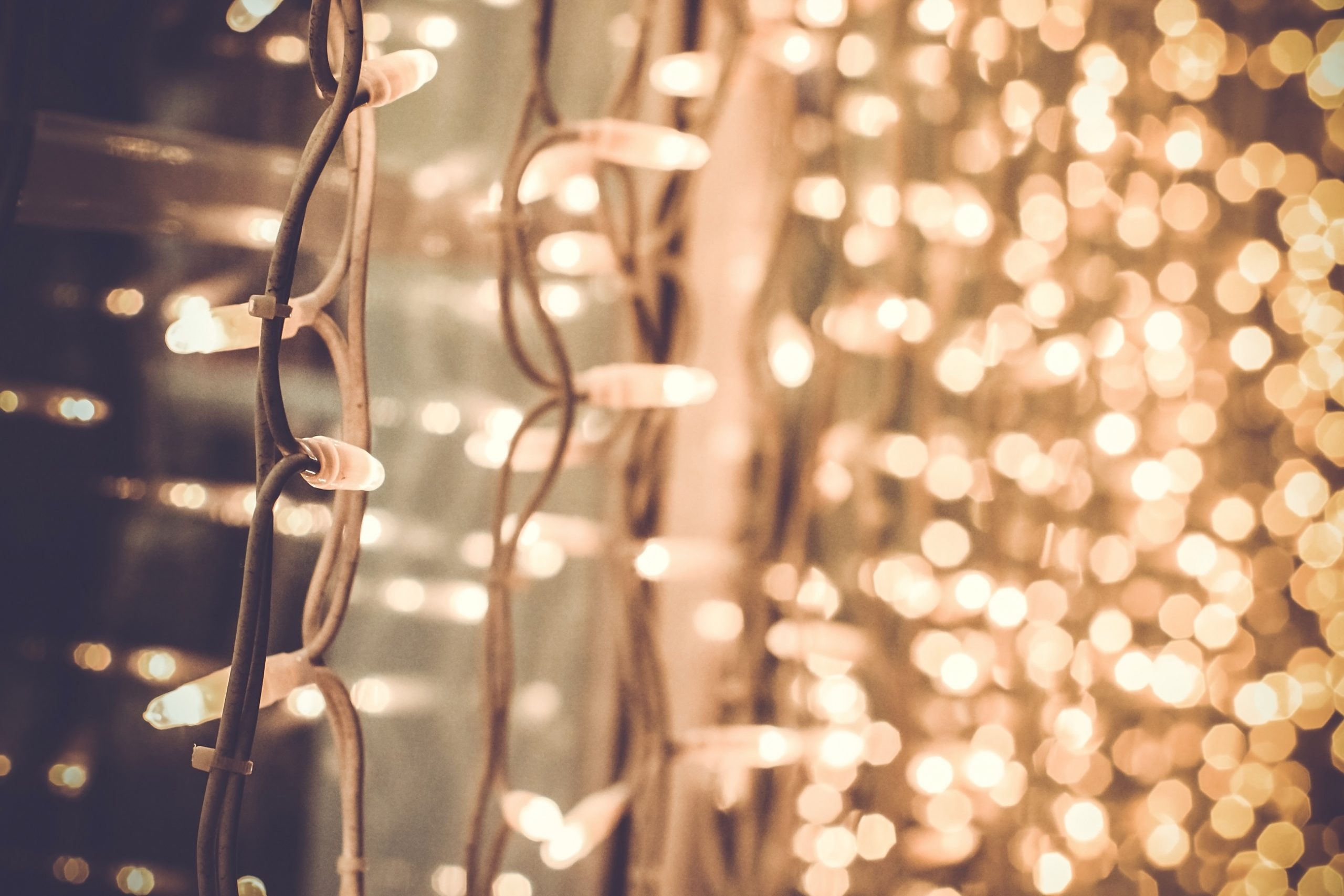 bright gorgeous beautiful christmas lights on the window in the street on a christmas day